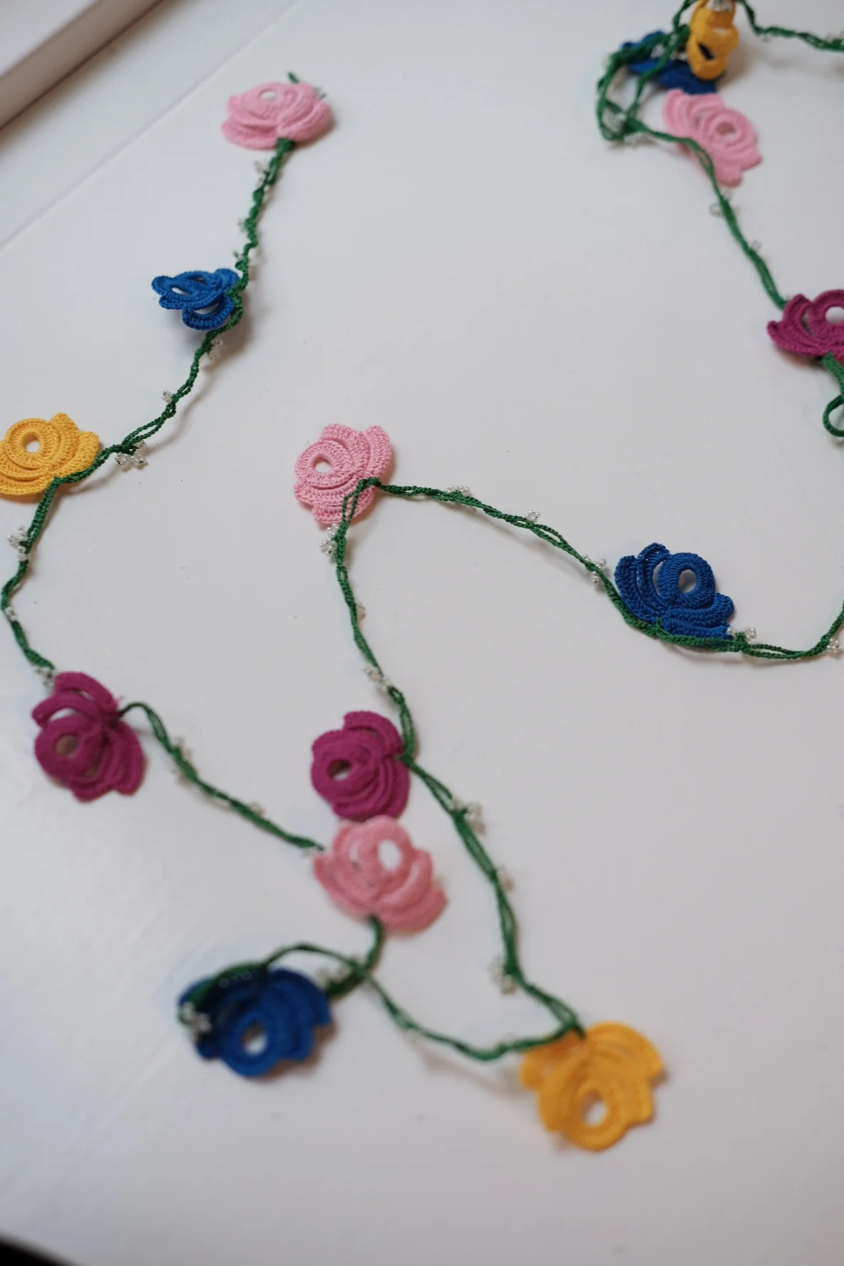 Guirlande • Kniplet • Blomster • Grøn